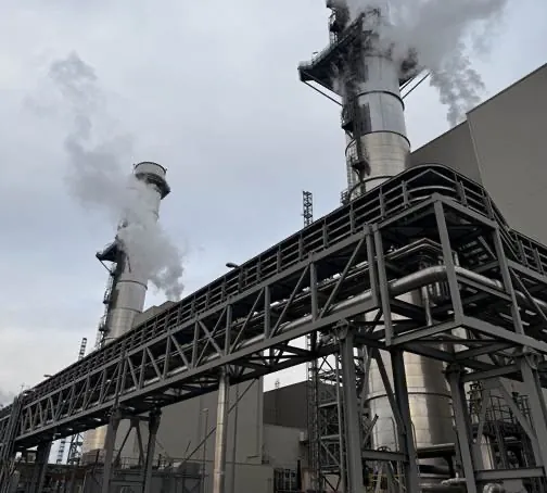Power facility stacks and pipework requiring industrial noise control